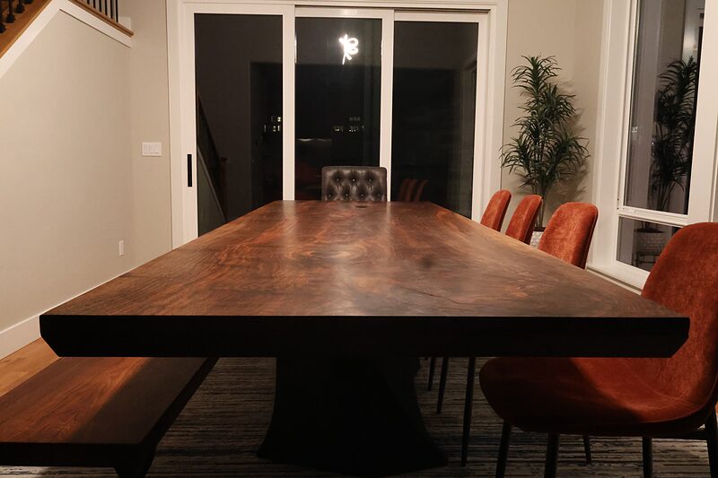 Gathering Place table at dusk with the dining room lights on